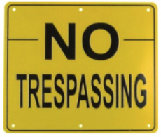 “NO TRESPASSING” Sign